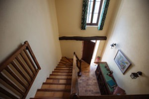 Stairs in hallway to all the rooms